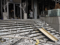 Destruction and damage to residential and office buildings occur as a result of a Russian missile strike in central Kyiv, Ukraine, on Decemb...