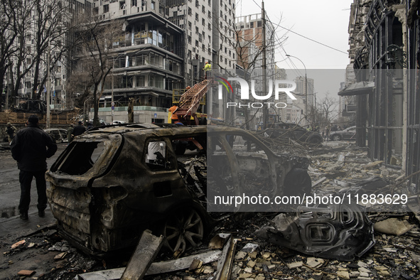 Destruction and damage to residential and office buildings occur as a result of a Russian missile strike in central Kyiv, Ukraine, on Decemb...