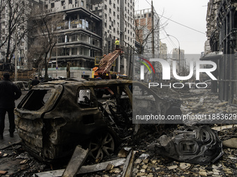 Destruction and damage to residential and office buildings occur as a result of a Russian missile strike in central Kyiv, Ukraine, on Decemb...