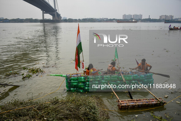 A boat made out of plastic bottles is displayed during the annual boat festival in Kolkata, India, on December 20, 2024. This kind of sustai...