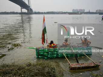 A boat made out of plastic bottles is displayed during the annual boat festival in Kolkata, India, on December 20, 2024. This kind of sustai...