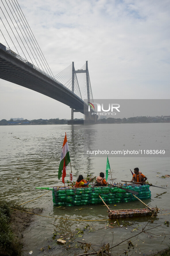 A boat made out of plastic bottles is displayed during the annual boat festival in Kolkata, India, on December 20, 2024. This kind of sustai...