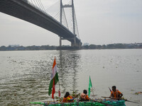 A boat made out of plastic bottles is displayed during the annual boat festival in Kolkata, India, on December 20, 2024. This kind of sustai...