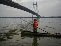 A boat made out of a palm tree is displayed during the annual boat festival in Kolkata, India, on December 20, 2024. (