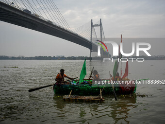 A boat made out of plastic bottles is displayed during the annual boat festival in Kolkata, India, on December 20, 2024. This kind of sustai...