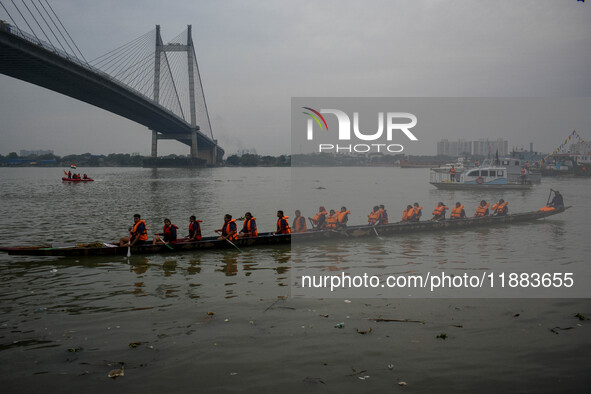 A Baich racing boat is displayed during the annual boat festival in Kolkata, India, on December 20, 2024. Nouka Baich is a traditional drago...