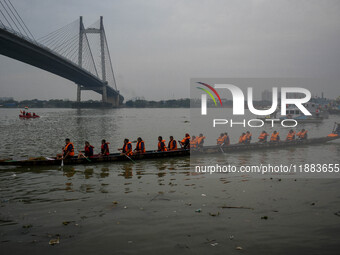 A Baich racing boat is displayed during the annual boat festival in Kolkata, India, on December 20, 2024. Nouka Baich is a traditional drago...