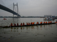 A Baich racing boat is displayed during the annual boat festival in Kolkata, India, on December 20, 2024. Nouka Baich is a traditional drago...