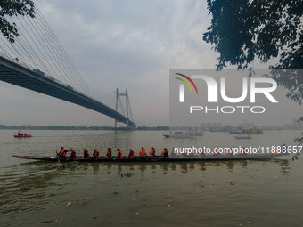 A Baich racing boat is displayed during the annual boat festival in Kolkata, India, on December 20, 2024. Nouka Baich is a traditional drago...