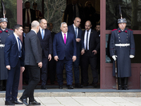 Hungarian Prime Minister Victor Orban (on the right) and President of Bulgaria Rumen Radev stand in front of the Presidency building in Sofi...