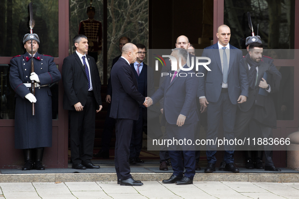 Hungarian Prime Minister Victor Orban (on the right) and President of Bulgaria Rumen Radev stand in front of the Presidency building in Sofi...