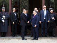 Hungarian Prime Minister Victor Orban (on the right) and President of Bulgaria Rumen Radev stand in front of the Presidency building in Sofi...