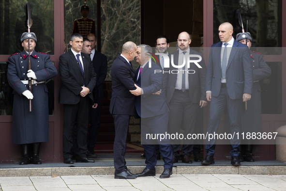 Hungarian Prime Minister Victor Orban (on the right) and President of Bulgaria Rumen Radev stand in front of the Presidency building in Sofi...