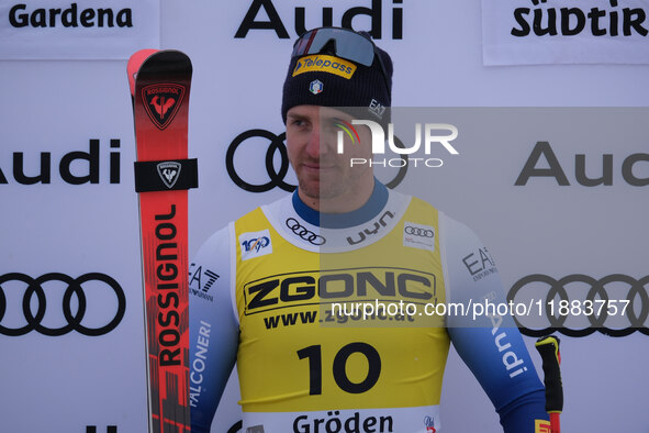 Mattia Casse of Team Italy secures first place in the Audi FIS Alpine Ski World Cup Men's Super Giant race on Saslong Slope in Val Gardena,...