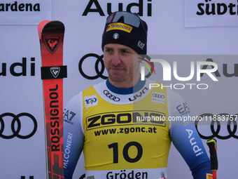 Mattia Casse of Team Italy secures first place in the Audi FIS Alpine Ski World Cup Men's Super Giant race on Saslong Slope in Val Gardena,...