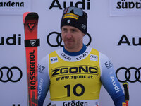 Mattia Casse of Team Italy secures first place in the Audi FIS Alpine Ski World Cup Men's Super Giant race on Saslong Slope in Val Gardena,...