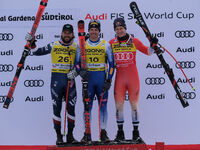 (From left to right) Jared Goldberg of Team United States in second place, Mattia Casse of Team Italy in first place, and Marco Odermatt of...