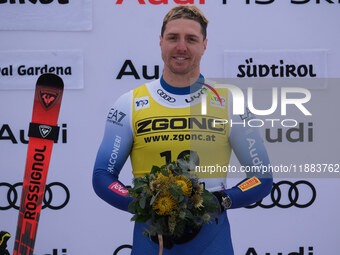 Mattia Casse of Team Italy secures first place in the Audi FIS Alpine Ski World Cup, Men's Super Giant race on Saslong Slope in Val Gardena,...