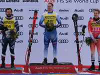 (From left to right) Jared Goldberg of Team United States in second place, Mattia Casse of Team Italy in first place, and Marco Odermatt of...