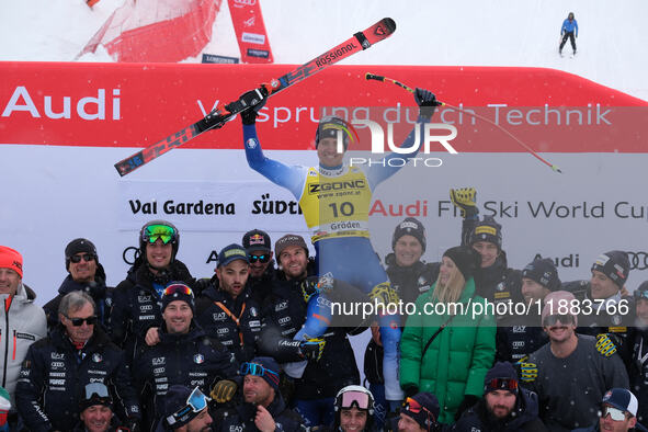 Mattia Casse and the Italian National Ski Team celebrate the victory of the Audi FIS Alpine Ski World Cup, Men's Super Giant race on Saslong...