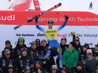 Mattia Casse and the Italian National Ski Team celebrate the victory of the Audi FIS Alpine Ski World Cup, Men's Super Giant race on Saslong...