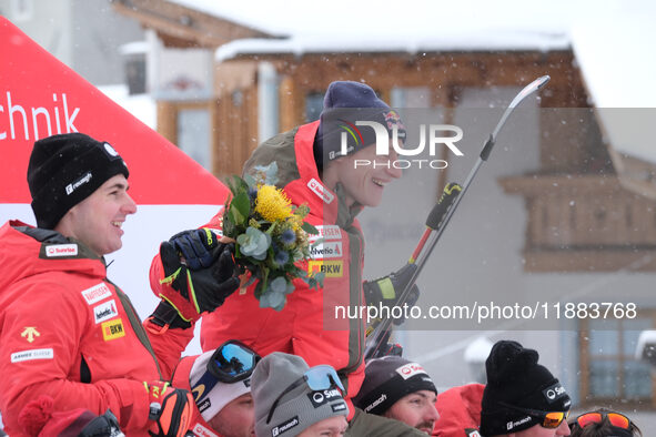 Marco Odermatt of Team Switzerland and the Switzerland Ski Team celebrates third place in the Audi FIS Alpine Ski World Cup, Men's Super Gia...