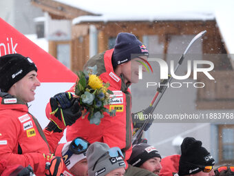 Marco Odermatt of Team Switzerland and the Switzerland Ski Team celebrates third place in the Audi FIS Alpine Ski World Cup, Men's Super Gia...