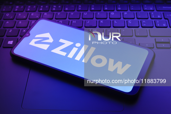 The Zillow Group, Inc. logo appears on a smartphone screen in this illustration photo in Reno, United States, on December 20, 2024. 