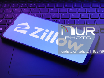 The Zillow Group, Inc. logo appears on a smartphone screen in this illustration photo in Reno, United States, on December 20, 2024. (