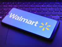 The Walmart, Inc. logo appears on a smartphone screen in this illustration photo in Reno, United States, on December 20, 2024. (