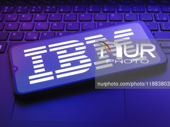 The International Business Machines Corporation (IBM) logo appears on a smartphone screen in this illustration photo in Reno, United States,...