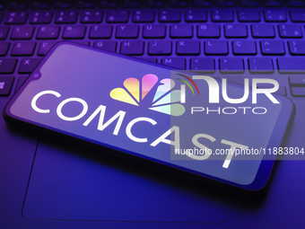 The Comcast Corporation logo appears on a smartphone screen in this illustration photo in Reno, United States, on December 20, 2024. (