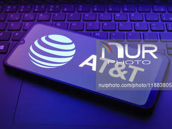 The AT&T logo appears on a smartphone screen in this illustration photo in Reno, United States, on December 20, 2024. (