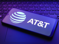 The AT&T logo appears on a smartphone screen in this illustration photo in Reno, United States, on December 20, 2024. (