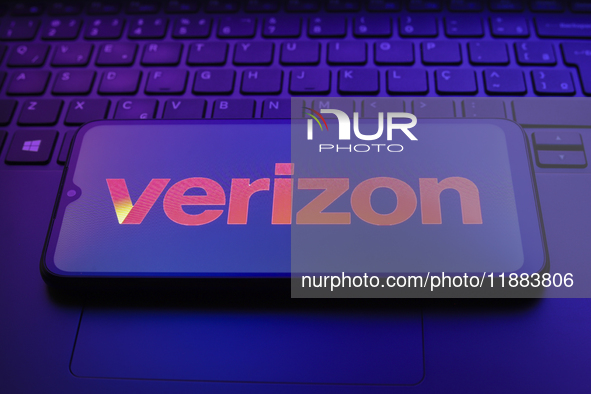 The Verizon Communications logo appears on a smartphone screen in this illustration photo in Reno, United States, on December 20, 2024. 