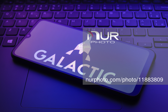 The Virgin Galactic logo appears on a smartphone screen in this illustration photo in Reno, United States, on December 20, 2024. 