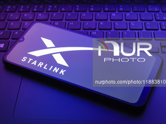 The Starlink logo appears on a smartphone screen in this illustration photo in Reno, United States, on December 20, 2024. (