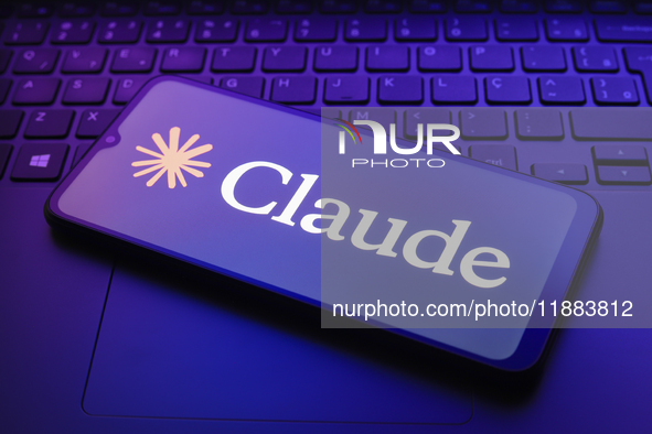 The Claude AI logo appears on a smartphone screen in this illustration photo in Reno, United States, on December 20, 2024. 