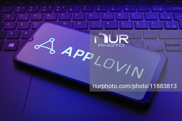 The AppLovin Corporation logo appears on a smartphone screen in this illustration photo in Reno, United States, on December 20, 2024. 