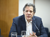 Finance Minister Fernando Haddad talks to journalists during a breakfast at the Finance Ministry in Brasilia, Brazil, on December 20, 2024....