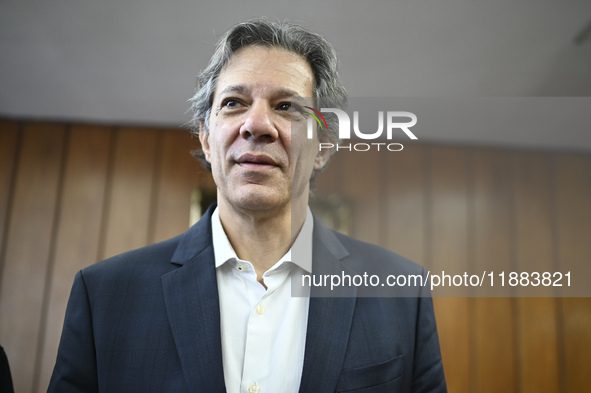 Finance Minister Fernando Haddad talks to journalists during a breakfast at the Finance Ministry in Brasilia, Brazil, on December 20, 2024. 