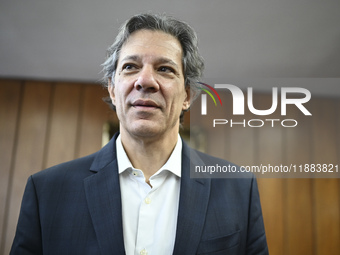 Finance Minister Fernando Haddad talks to journalists during a breakfast at the Finance Ministry in Brasilia, Brazil, on December 20, 2024....