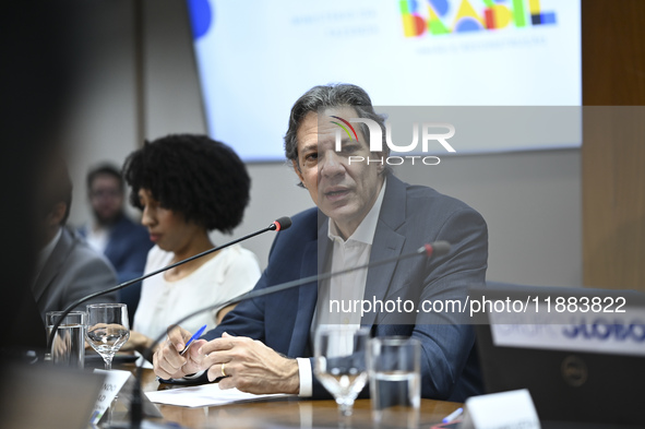 Finance Minister Fernando Haddad talks to journalists during a breakfast at the Finance Ministry in Brasilia, Brazil, on December 20, 2024. 