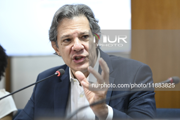 Finance Minister Fernando Haddad talks to journalists during a breakfast at the Finance Ministry in Brasilia, Brazil, on December 20, 2024. 