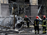 Firefighters put out a burning car in the Holosiivskyi district after a Russian missile attack in Kyiv, Ukraine, on December 20, 2024. On Fr...