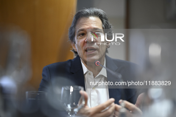 Finance Minister Fernando Haddad talks to journalists during a breakfast at the Finance Ministry in Brasilia, Brazil, on December 20, 2024. 