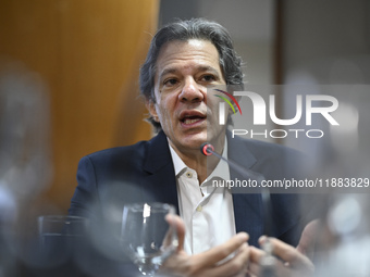 Finance Minister Fernando Haddad talks to journalists during a breakfast at the Finance Ministry in Brasilia, Brazil, on December 20, 2024....