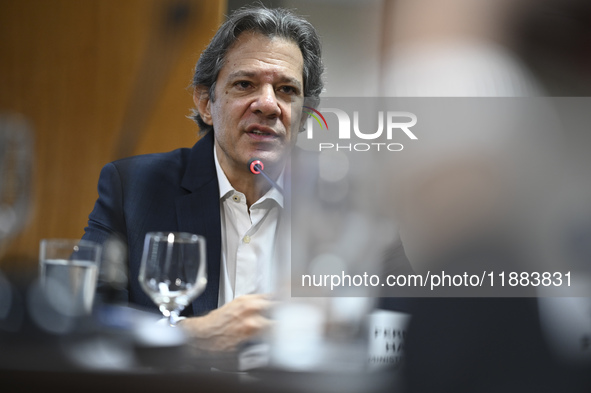 Finance Minister Fernando Haddad talks to journalists during a breakfast at the Finance Ministry in Brasilia, Brazil, on December 20, 2024. 