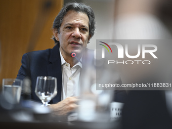 Finance Minister Fernando Haddad talks to journalists during a breakfast at the Finance Ministry in Brasilia, Brazil, on December 20, 2024....