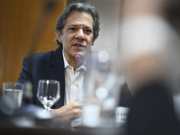 Finance Minister Fernando Haddad talks to journalists during a breakfast at the Finance Ministry in Brasilia, Brazil, on December 20, 2024....